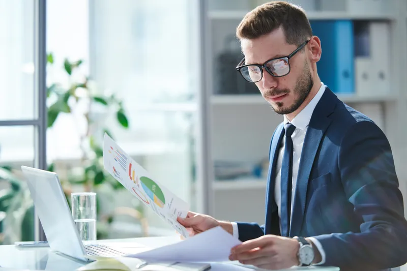 finance director looking at papers